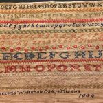 1859 needlework sampler by Victoria Whitehair, age 12, a student at the Osage Mission in Kansas.