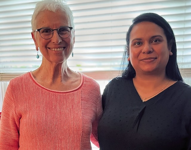 Two sisters of Loreto, an older member and a novice smile together for a picture on Easter.