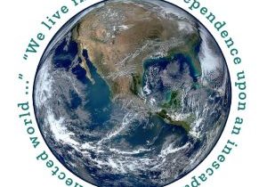 A circular photo of the earth from space with the text "We live in complete dependence upon an inescapably interconnected world..." wrapped around it.